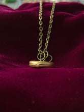 Load image into Gallery viewer, Photo of the side of the pendant displaying how it latches together