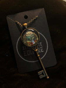 Vanitas print in brass key pendant