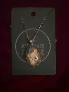 Skull and Candle Print in Oval Pendant