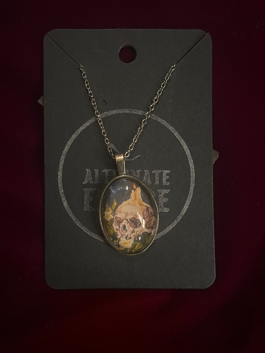 Skull and Candle Print in Oval Pendant