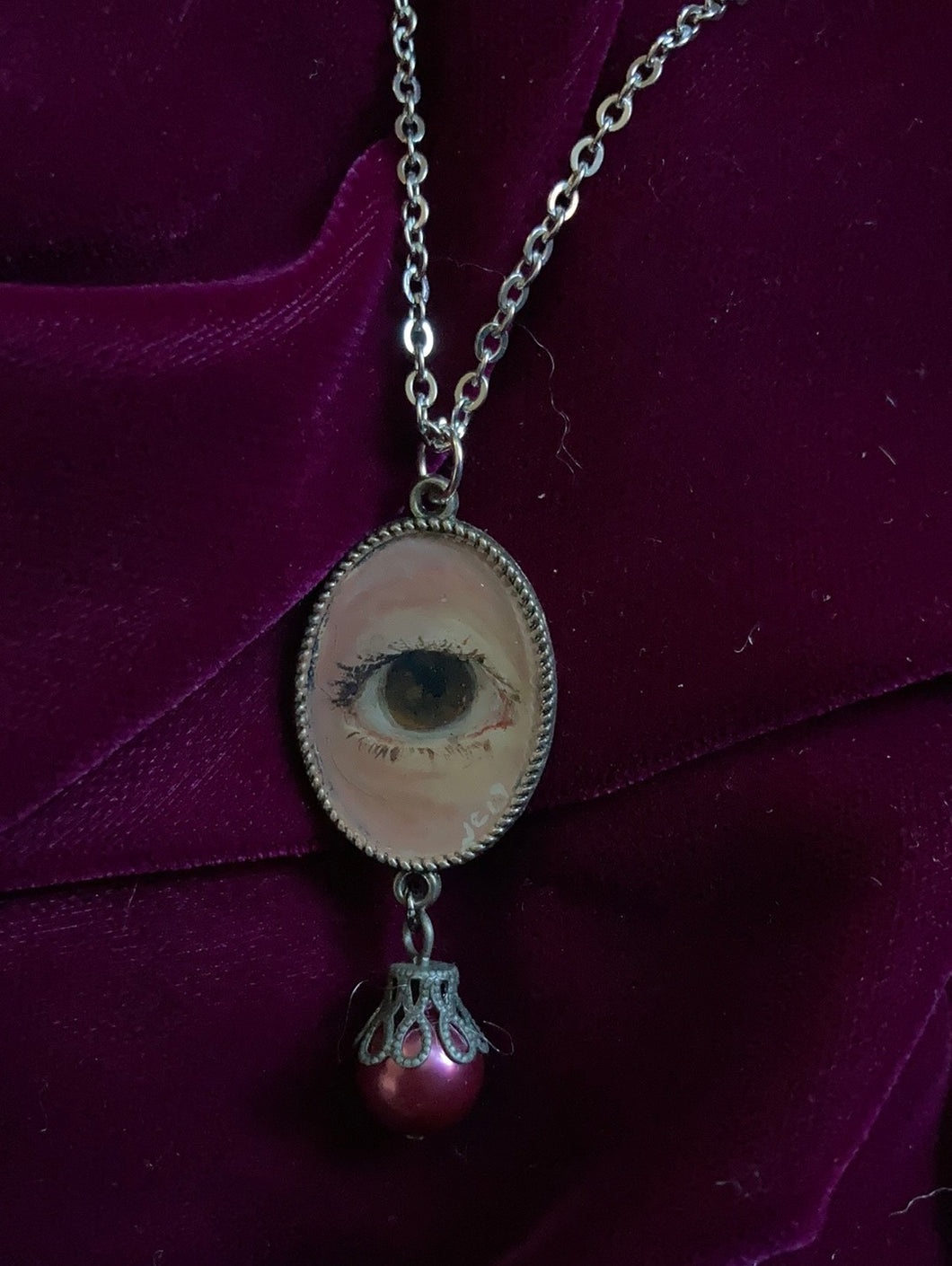 Lover's Eye Pendant with Purple Bead