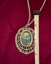 Load image into Gallery viewer, Skull and Blue Flowers in Victorian Pendant
